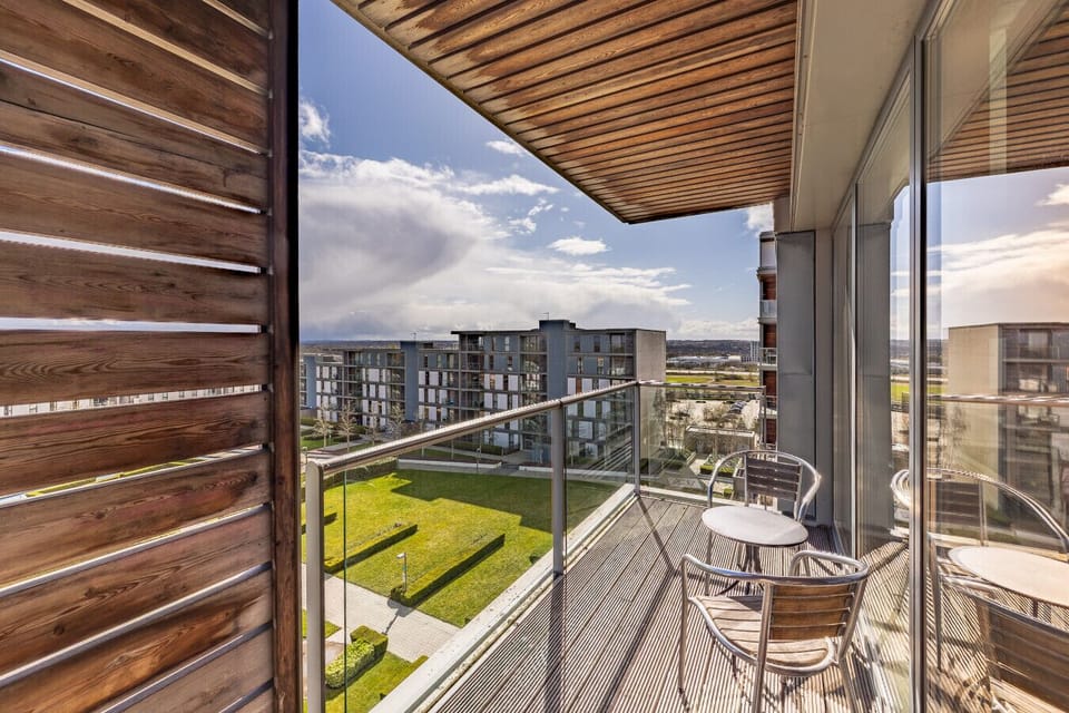 Walk-out balcony with beautiful garden views.