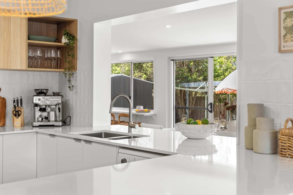 Kitchen with generous countertop space for meal preparation.