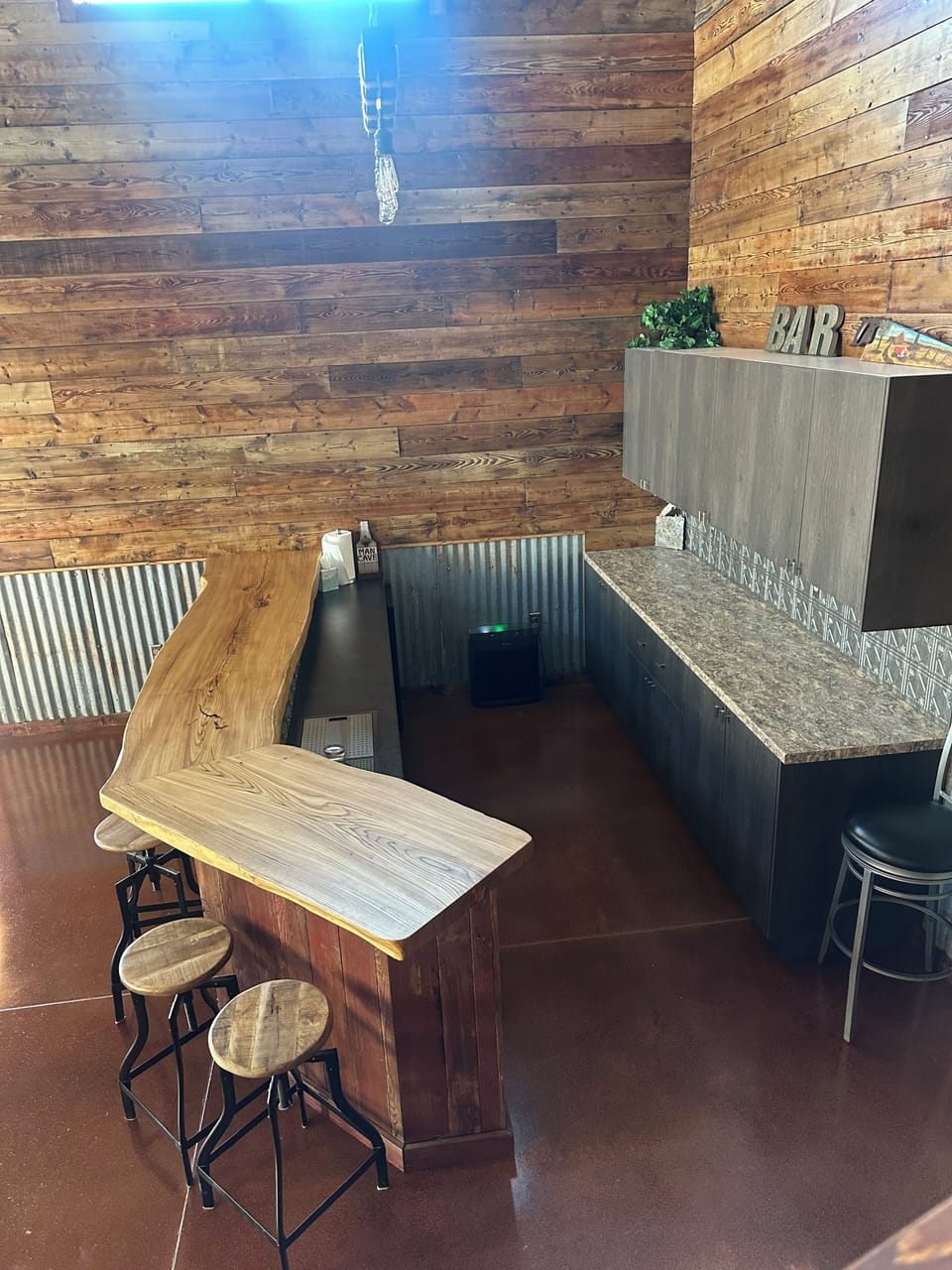 Bar with mini fridge.