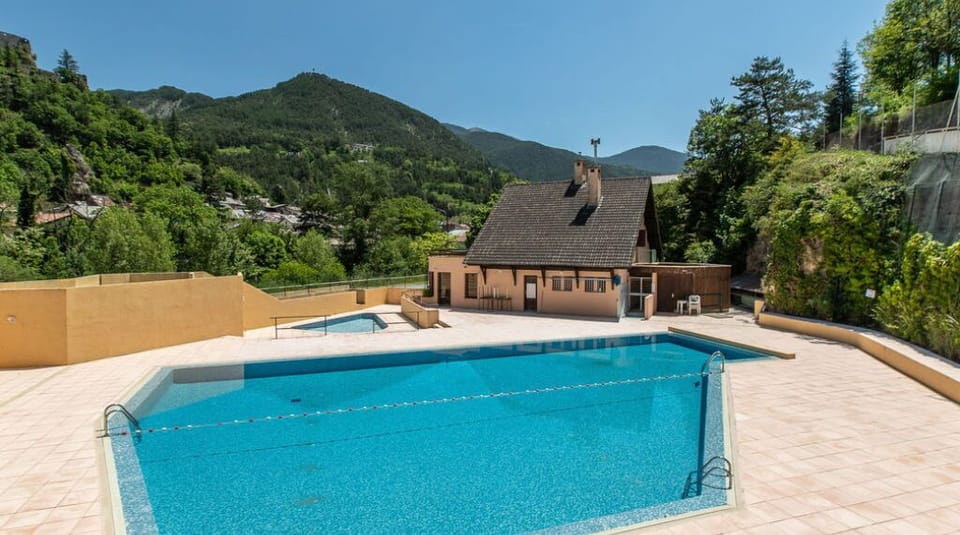 Take in gorgeous views while lounging around the on-site outdoor pool.