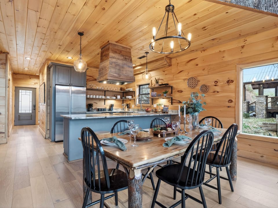 Dining area with soaring windows and easy flow into the great room and deck.