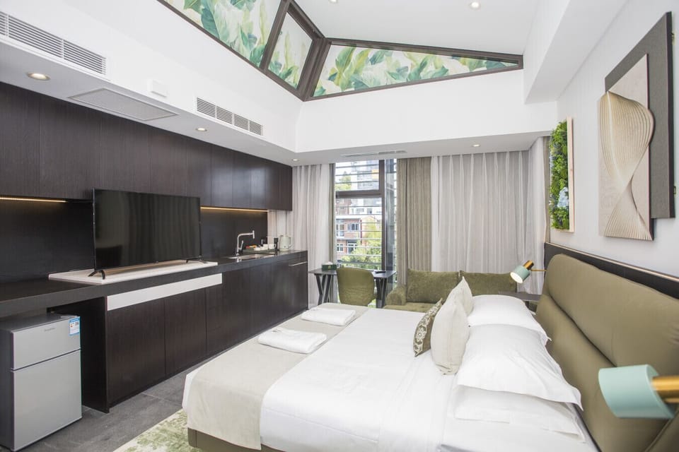 Bright and modern room with clean design and botanical touches.