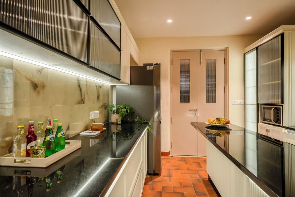 Deluxe Room | Private kitchen | Fridge, stovetop, electric kettle, toaster
