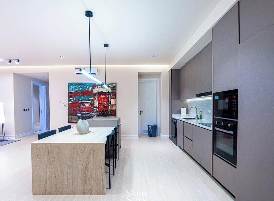 Deluxe Apartment, Balcony, Ocean View | Private kitchen | Fridge, microwave, oven, stovetop