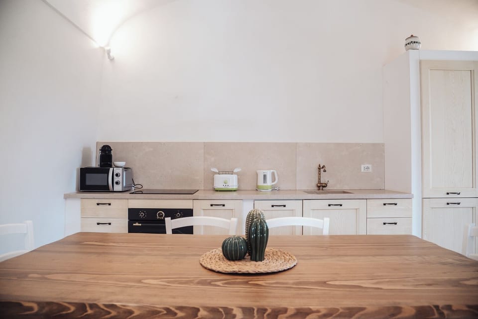 Family Apartment, Patio, Garden View | Private kitchen | Fridge, stovetop, espresso maker, toaster