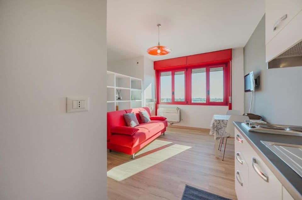 Deluxe Apartment | Living area | Flat-screen TV