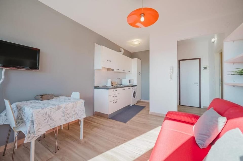 Deluxe Apartment | Living area | Flat-screen TV