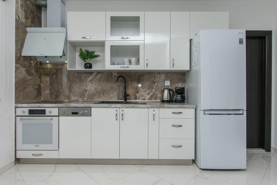 Apartment (A1) | Private kitchen | Espresso maker, fridge, oven, stovetop