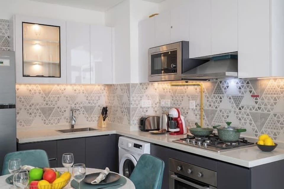Luxury Apartment, Balcony, City View | Private kitchen | Full-size fridge, microwave, oven, stovetop