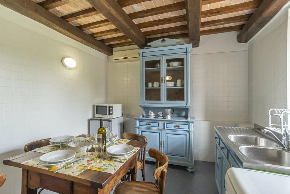 Furniture, Interior Design, Wood, Ceiling, Flooring, Countertop, Cabinetry, Kitchen, Room, Floor