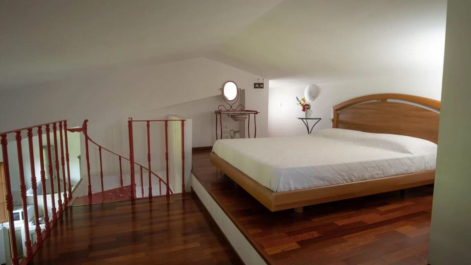 Furniture, Interior Design, Bed, Flooring, Bedroom, Floor, Wall, Wood, Ceiling, Wood Flooring