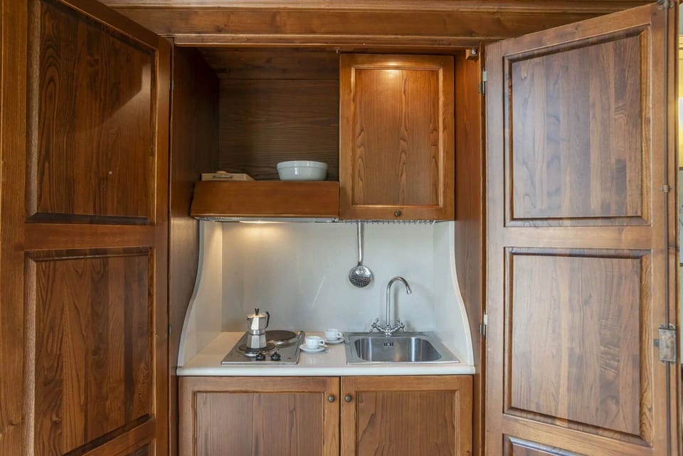 Wood, Cabinetry, Flooring, Cupboard, Interior Design, Furniture, Room, Floor, Wood Stain, Countertop