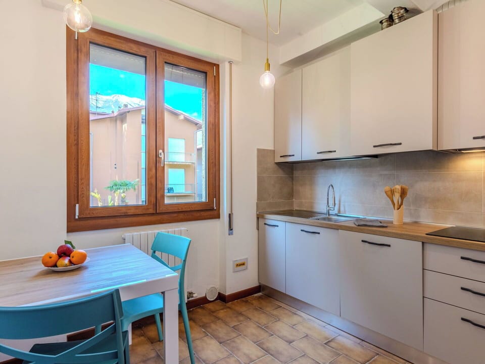 Furniture, Interior Design, Flooring, Wood, Major Appliance, Kitchen, Countertop, Floor, Kitchen Appliance, Room