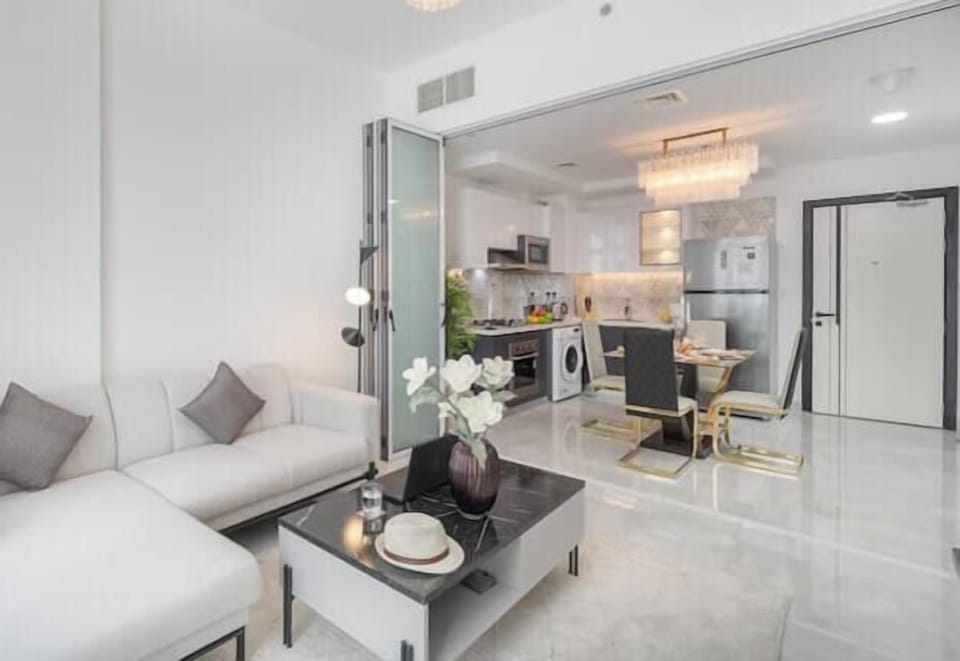 Luxury Apartment, Balcony, City View | Living area | 65-inch Smart TV with cable channels, foosball, table tennis