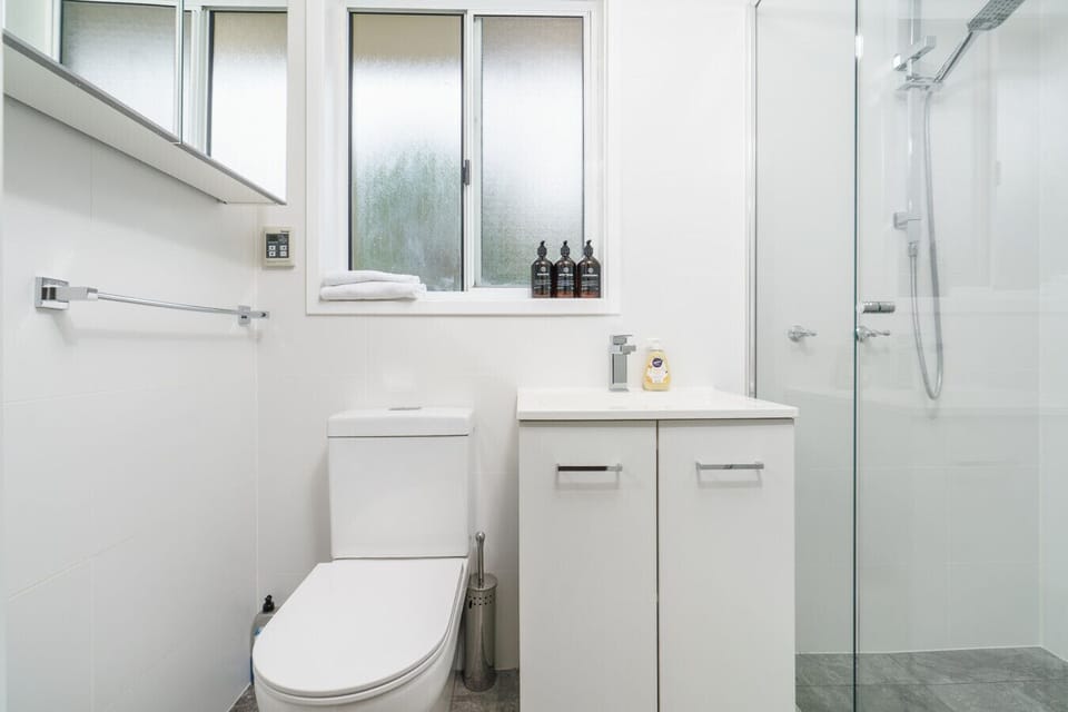 Bright and airy bathroom designed for comfort and ease during your stay.