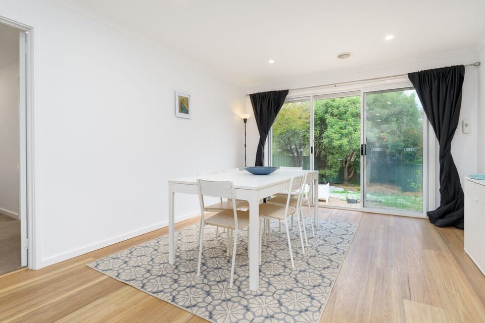 A bright and airy dining nook with a welcoming, homely feel.