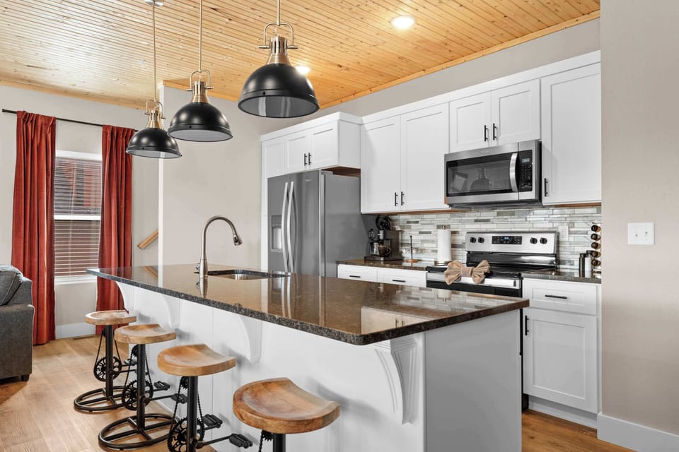 The open kitchen offers ample space & all the comforts of home​