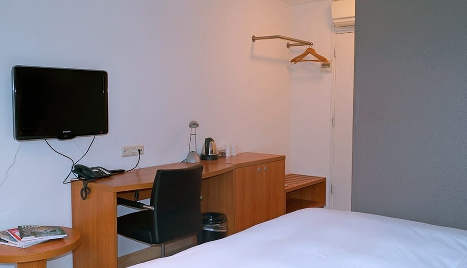 Catch up on work or shows at the in-room desk.