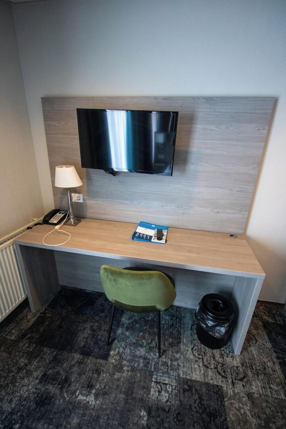 Settle in and catch up on work with mounted TV.