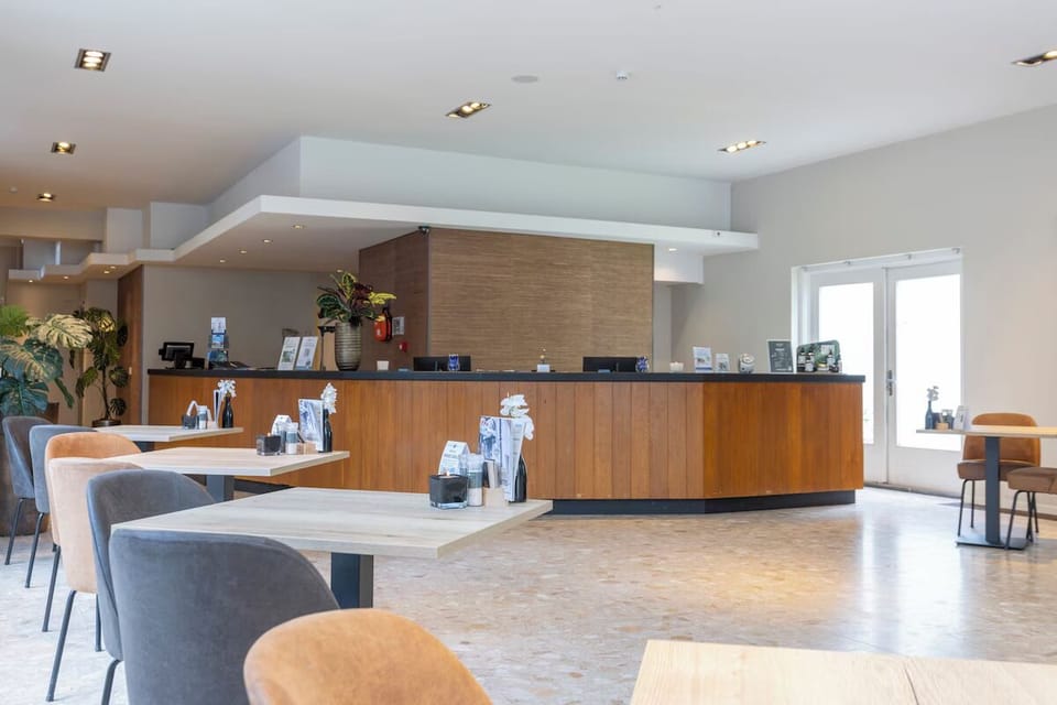 Arrive effortlessly and feel welcomed at the sleek reception lounge.