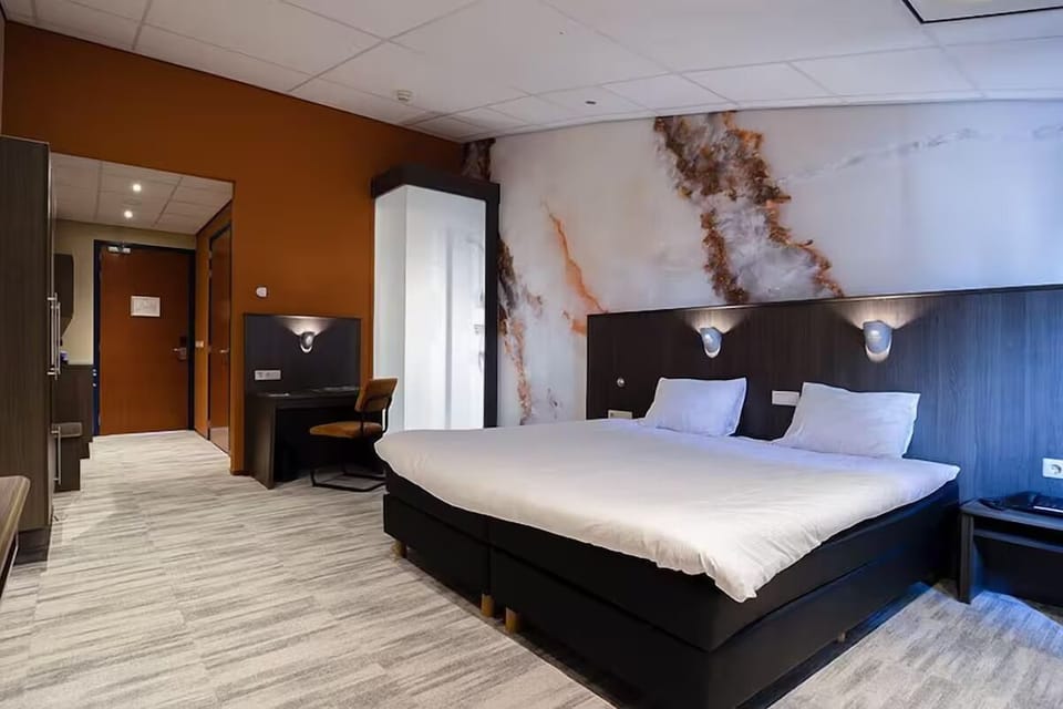 Stretch out in a spacious, modern room made for rest.