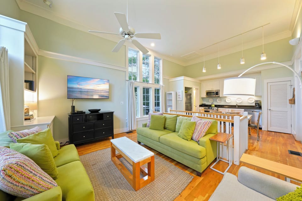 LIVING AREA WITH PLENTY OF COMFORTABLE SEATING