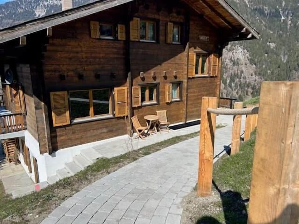 The well-maintained path leads directly to the chalet.