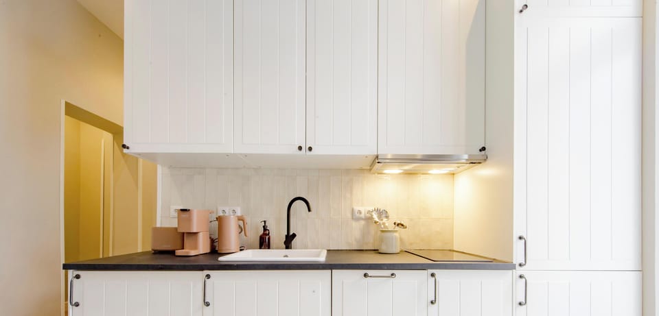 Family Apartment, Courtyard View | Private kitchen | Fridge, microwave, stovetop, dishwasher