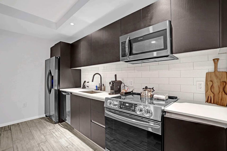 Full kitchen with subway tile backsplash