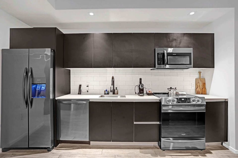 Modern kitchen with stainless steel appliances