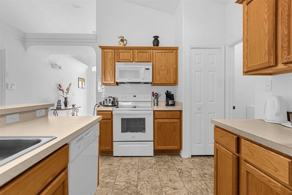 Kitchen with Stove, Microwave, and Dishwasher