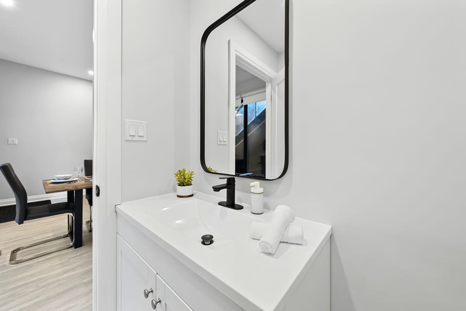 Bathroom conveniently located near the dining area for easy access.
