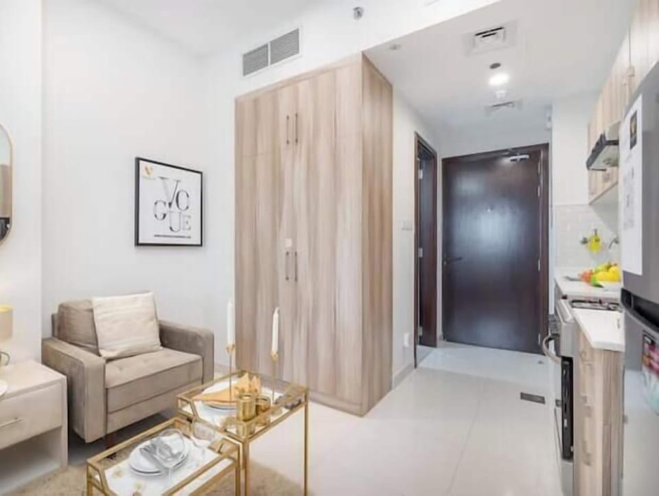 Luxury Studio, Balcony, City View | Living area | 55-inch Smart TV with cable channels