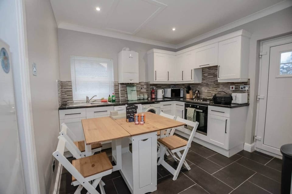 Fully equipped kitchen with everything needed for cooking, dining and longer stays