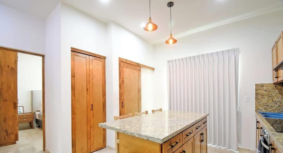 The island provides extra space for easy meal prep