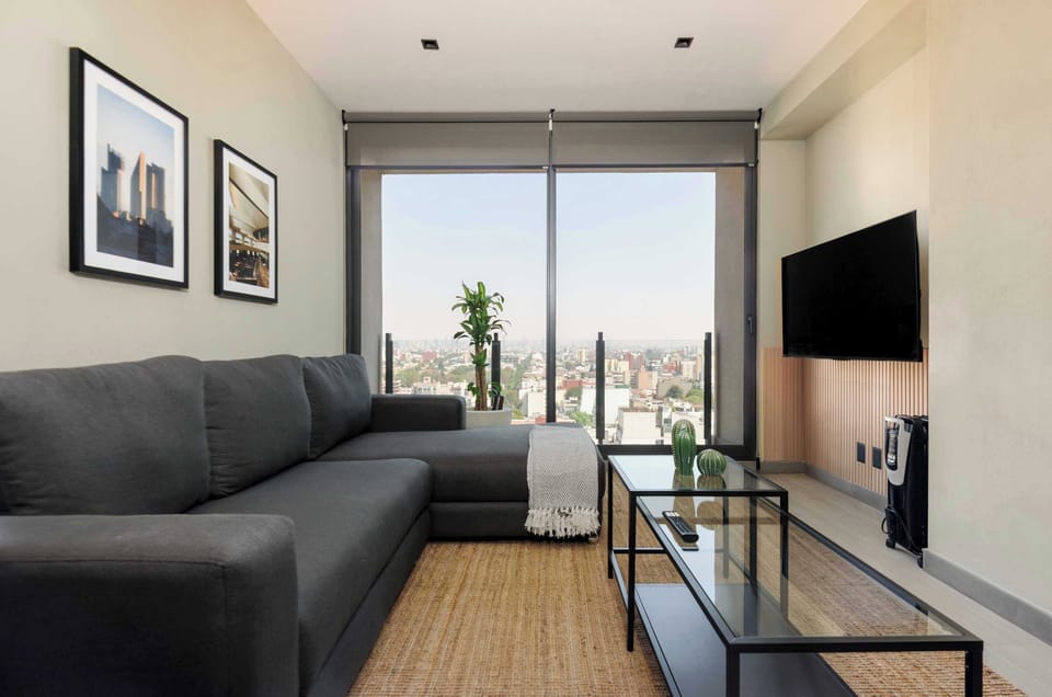 Living room with open city views.
