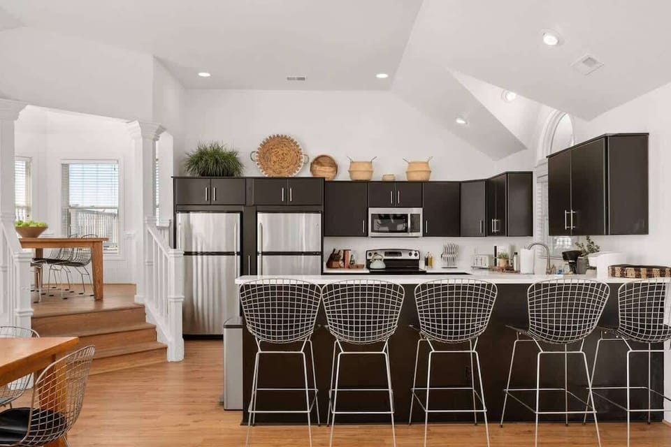 Fully stocked kitchen with 2 refrigerators, 2 dishwasher and tons of seating for all. 