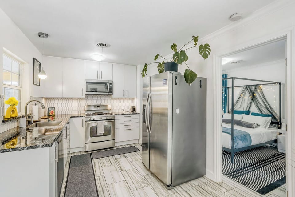 Modern kitchen with updated appliances, ample counter space, and everything you need for home-cooked meals
