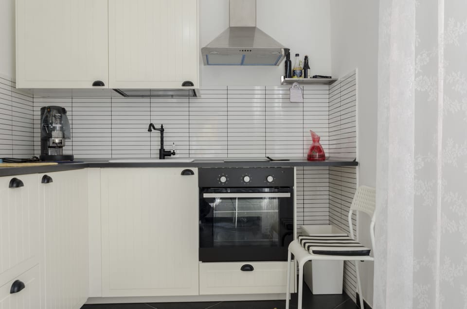 Superior Apartment, Balcony | Private kitchen | Coffee/tea maker, electric kettle