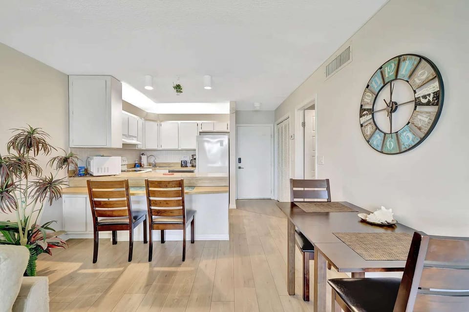 Functional kitchen with a dining table right near the cooking area.