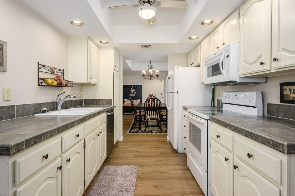 Bright, spacious kitchen with modern appliances and cozy dining nook