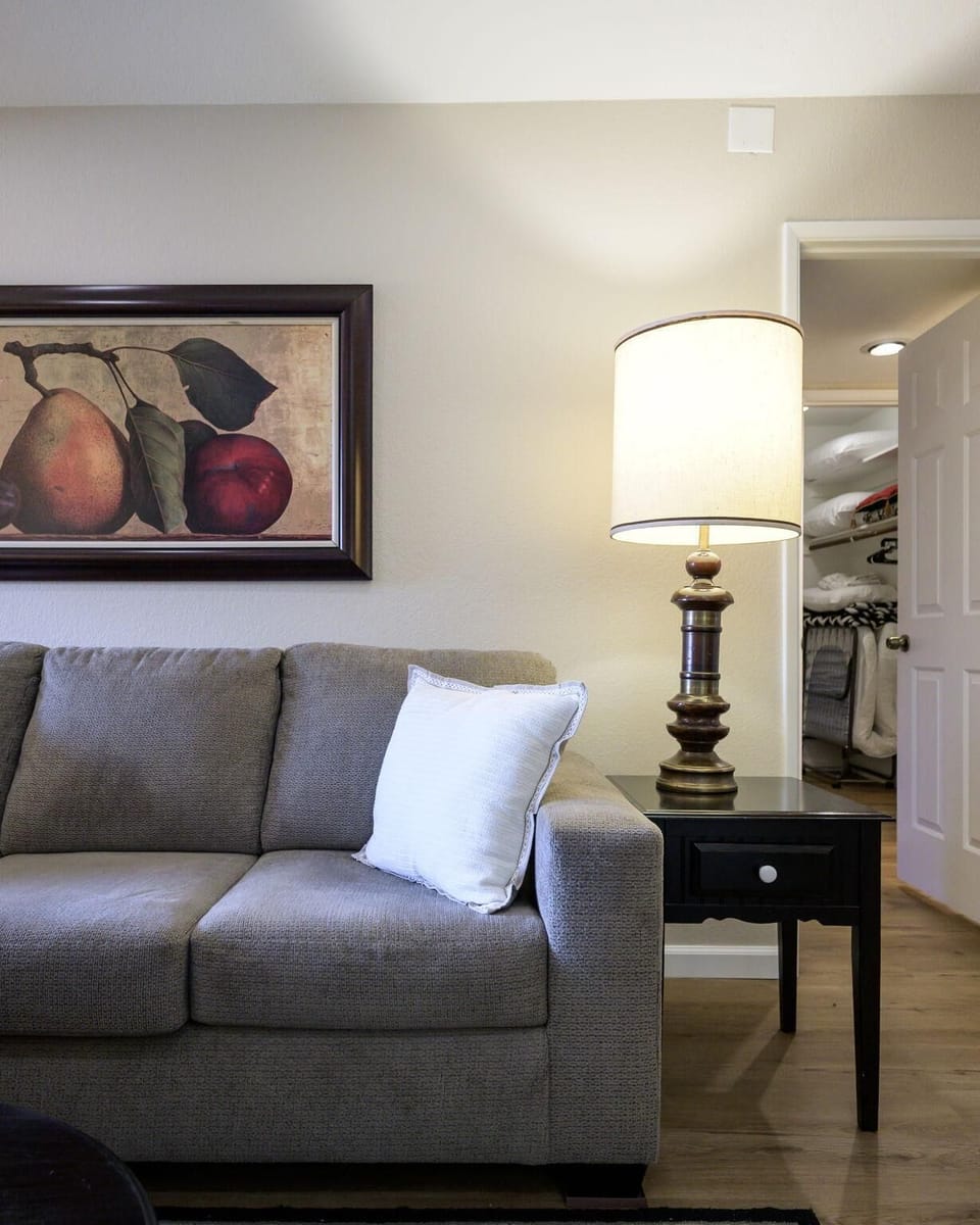 Cozy living room with plush sofa and warm lighting
