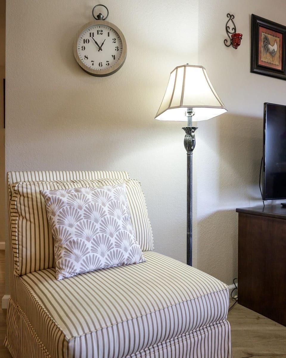 Cozy reading nook with soft lighting and classic charm
