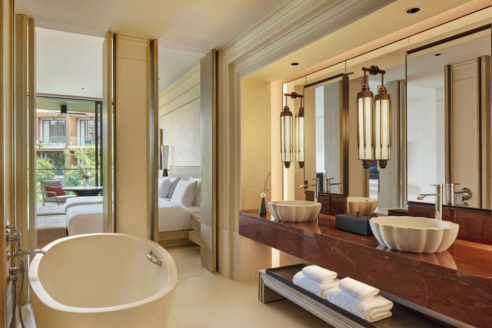 Separate tub and shower, deep soaking tub, eco-friendly toiletries