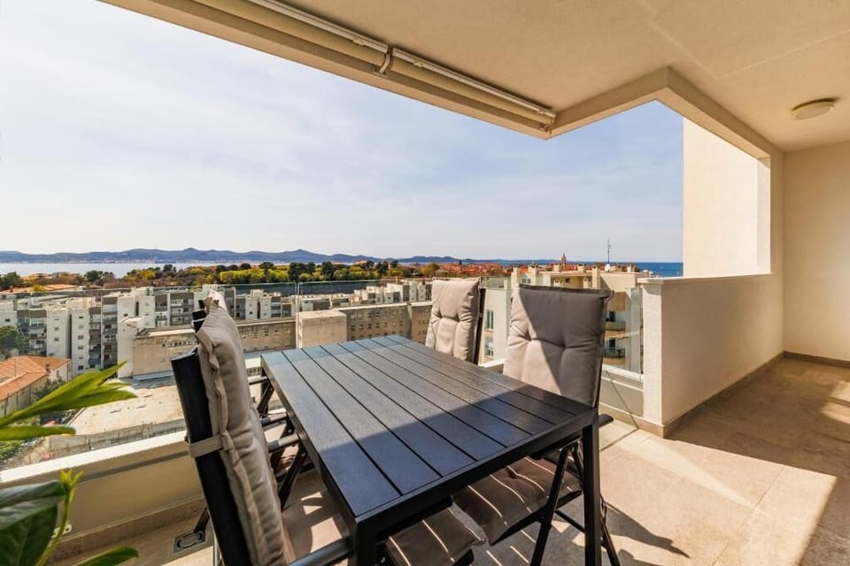 Apartment, Balcony, Sea View | Outdoor dining