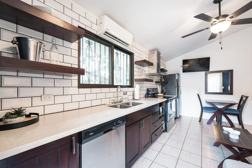 Prepare meals with ease in a kitchen that offers both oven and dishwasher — comfort without compromise.