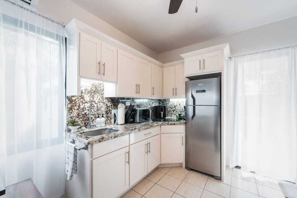 Compact yet complete, the kitchenette makes staying in feel relaxed and convenient.