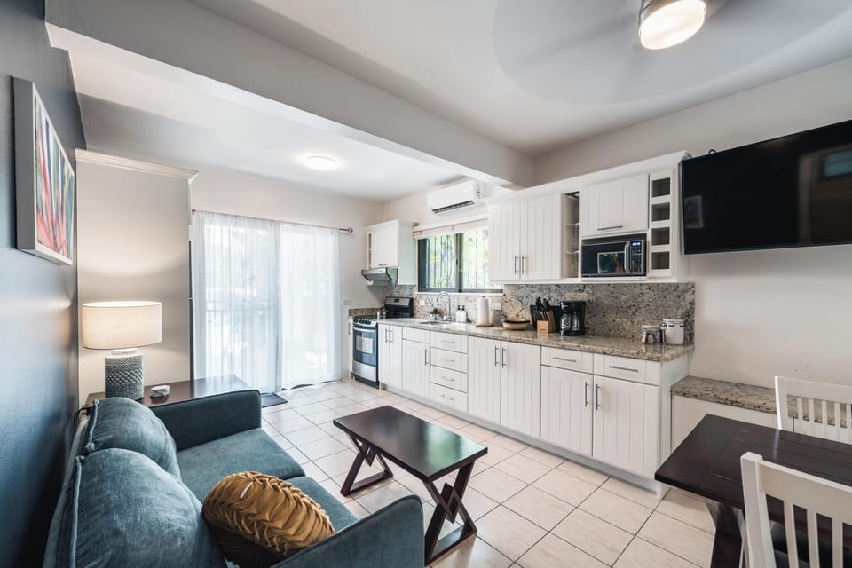 Garden Suite Three is tucked in the middle of the property on the ground level — peaceful, private, and just steps from the pool.