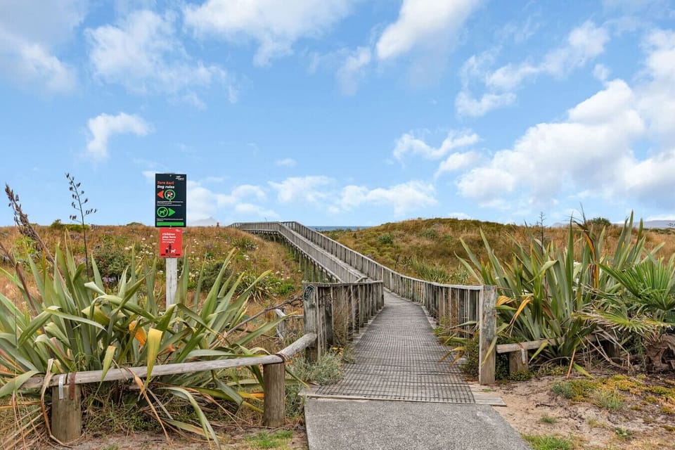 350m walk to Ruakaka Beach, Ruakaka Surf Club and Bach Cafe