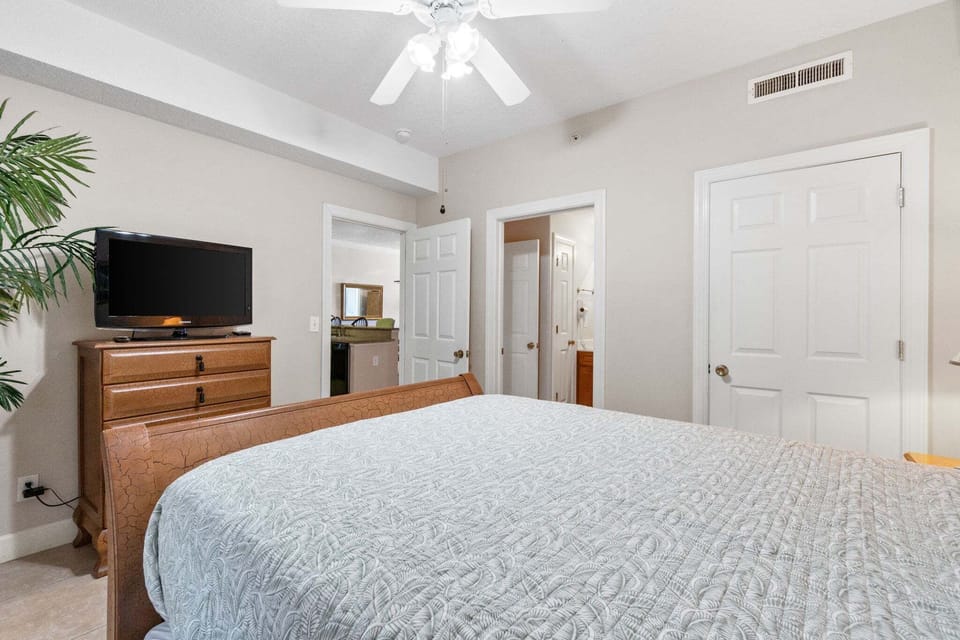 This bedroom offers direct access to the guest bathroom, making it easy for everyone to get ready.